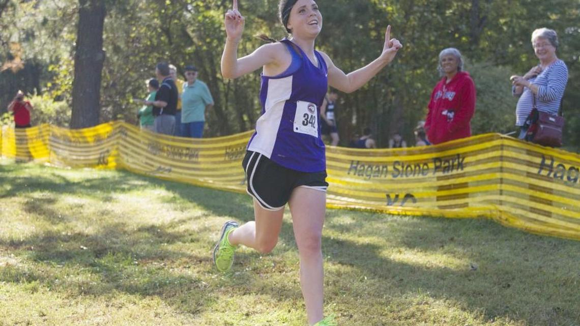 Class 1A Community Christian's Morgan Lane crosses the finish line to win the NCISAA State Cross Country Championships that took place at Hagan-Stone Park on October 28, 2016 in Pleasant Garden, North Carolina.
