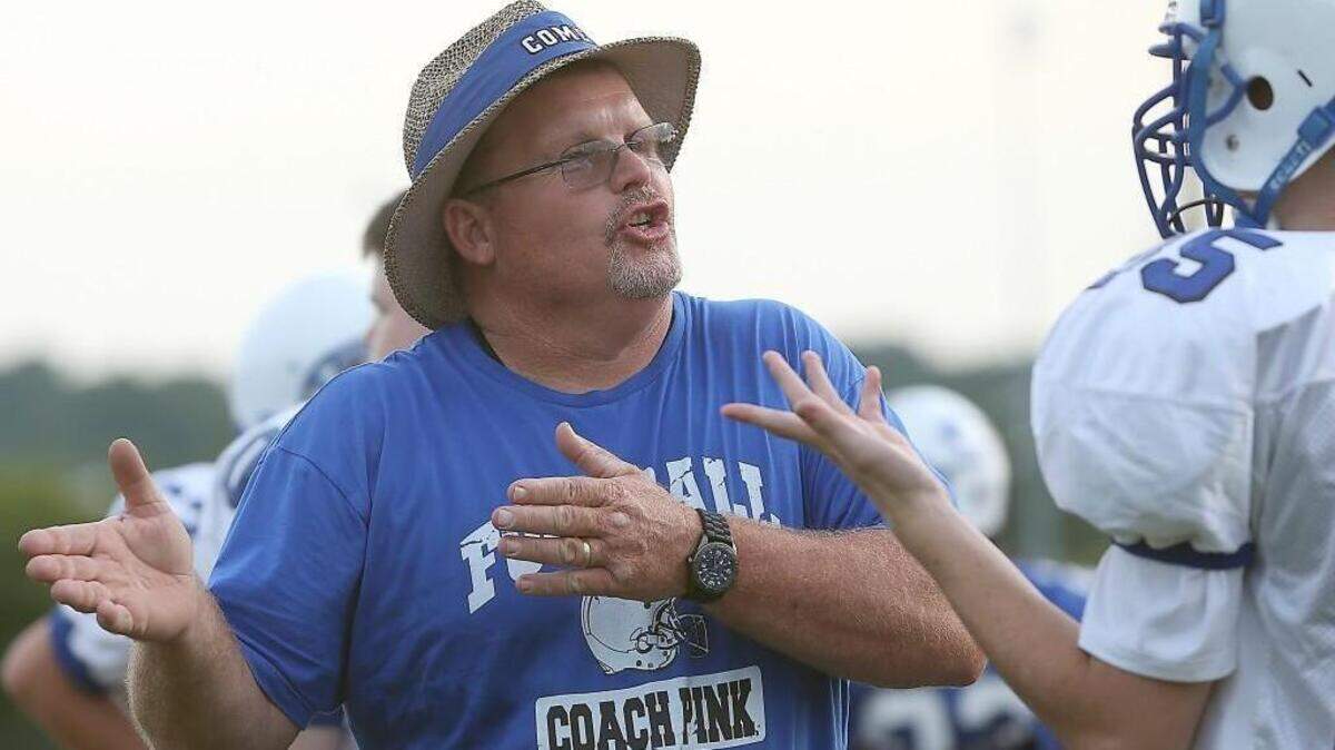 Clayton coach Randy Pinkowski explains the finer points of a play during a preaseson practice last August.