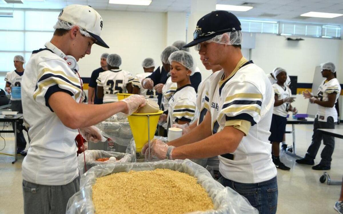 
The Smithfield-Selma football team package more than 10,000 meals for “Stop Hunger Now,” a non-profit international organization that provided 50 million meals in 2014 and more than 200 million meals since its founding.
