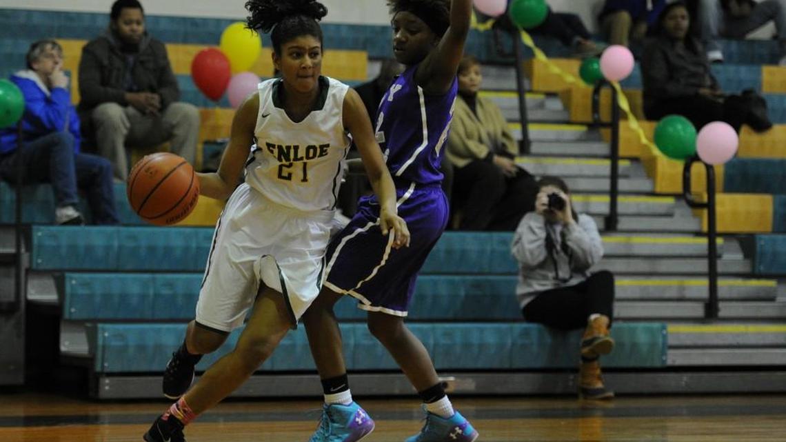 Enloe’s Shaiyana Brown (21) drives the ball to the hoop as the Broughton High School Capitals took on the Enloe High School Eagles on Senior Night at Enloe High School in Raleigh, NC on Tuesday, February 9.