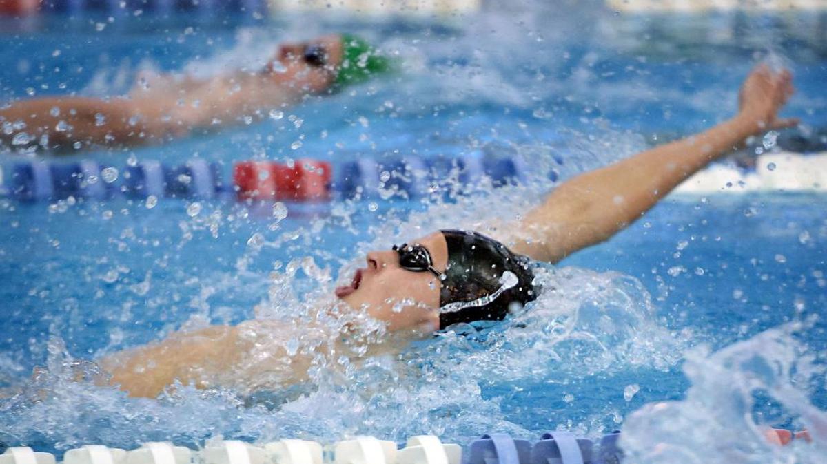 
Justin Ress of Cary swims in the Men's 200 Yard Individual Medley race during the NCHSAA 4A State Swimming Finals in Cary, N.C. on Saturday, February 14, 2015.

