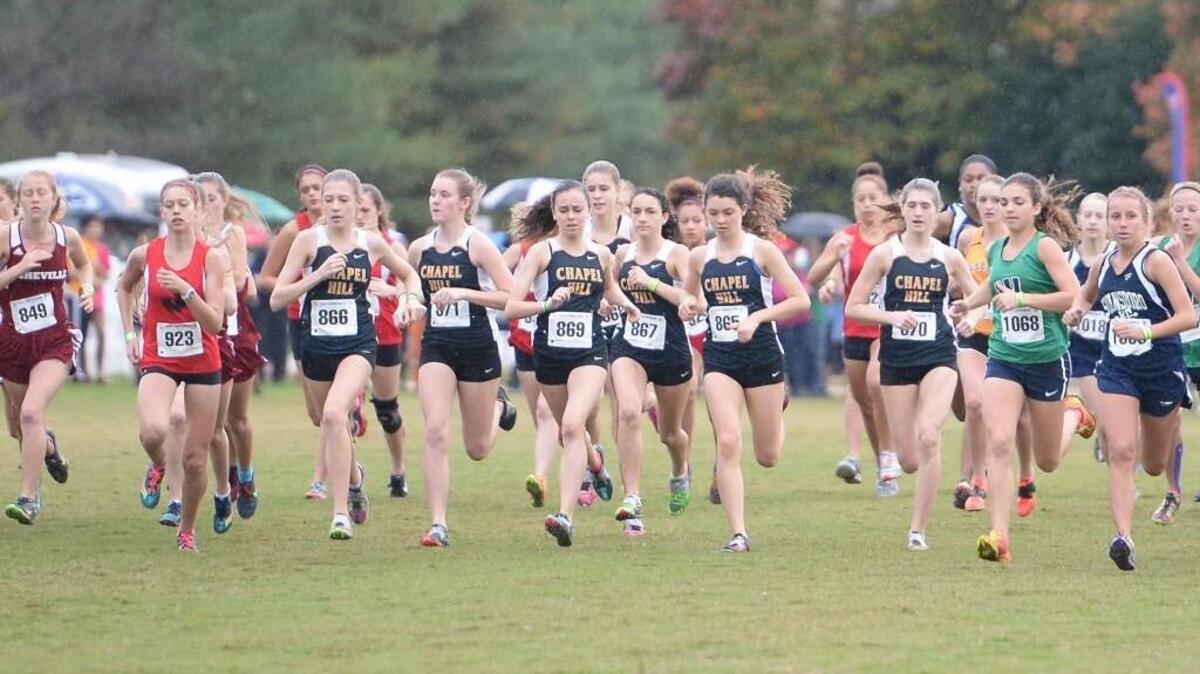 Chapel Hill’s girls team starts the race during the 3A NCHSAA Cross Country Championships that took place at the Ivey M. Redmon Sports Complex in Kernersville, N.C. on Saturday, November 7, 2015.