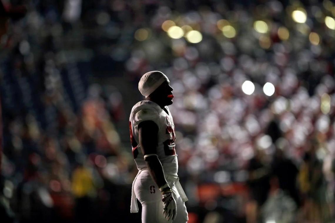 Stanford running back Bryce Love looks on during a delay after the stadium lights went down during game against San Diego State on Sept. 16, 2017, in San Diego. San Diego State won 20-17. (AP Photo/Gregory Bull)
