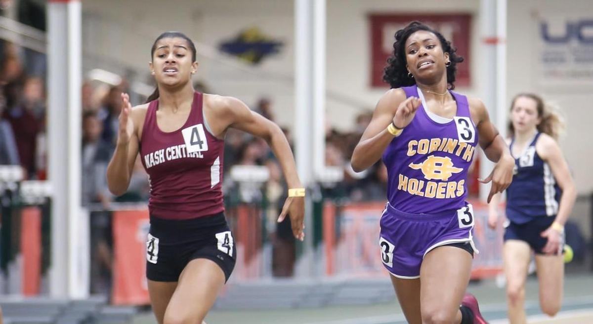 Nash Central's Micheala Nelms, left, outruns Corinth Holder's Samara Gibson to the finish line, taking 1st and 2nd respectively, in the 300 meter dash during the NCHSAA 3A indoor track state championship in Greensboro on Saturday, February 11, 2017.