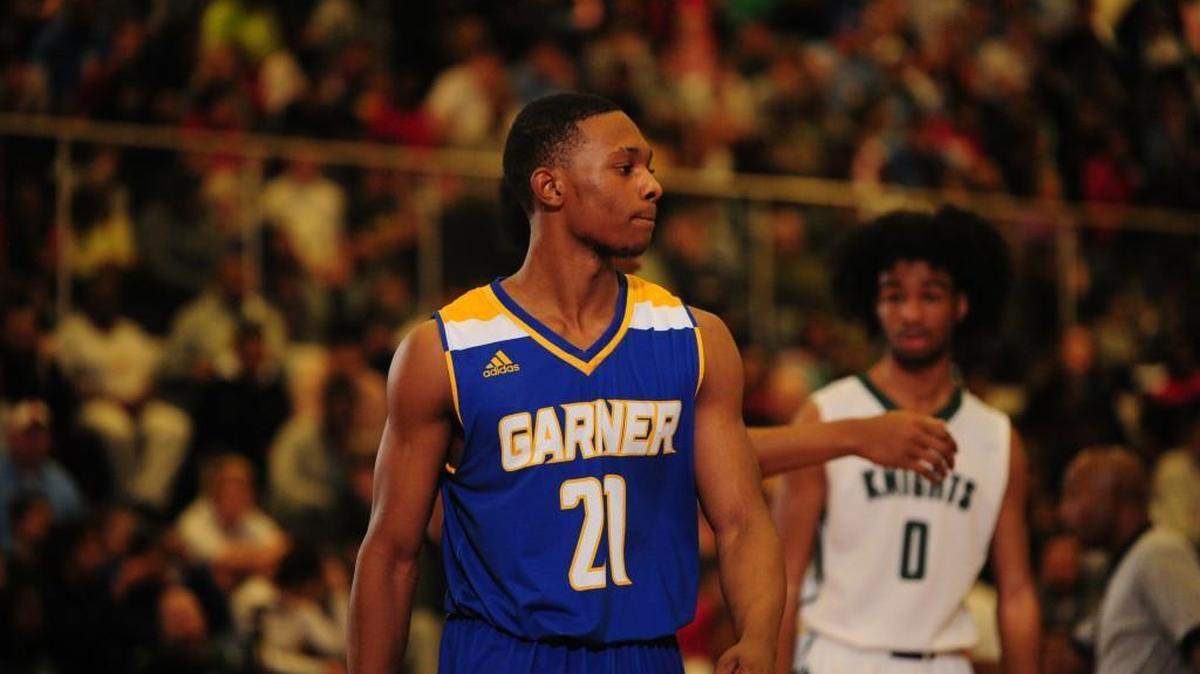Garner’s Trayvon Ferrell was named the MVP David West bracket boys basketball championship game in the John Wall Holiday Invitational on Dec. 30, 2017. The Trojans defeated the Greenfield School Knights 90-80.