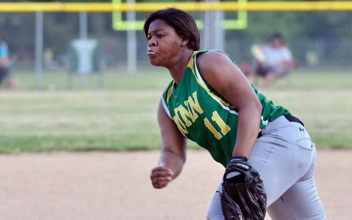 Bunn’s Erica Davis (11) releases a pitch in the Wildcats’ Northern Carolina 2A Conference softball game against South Granville in Bunn, N.C. Tuesday, April 26, 2016. Bunn won the game 1-0.