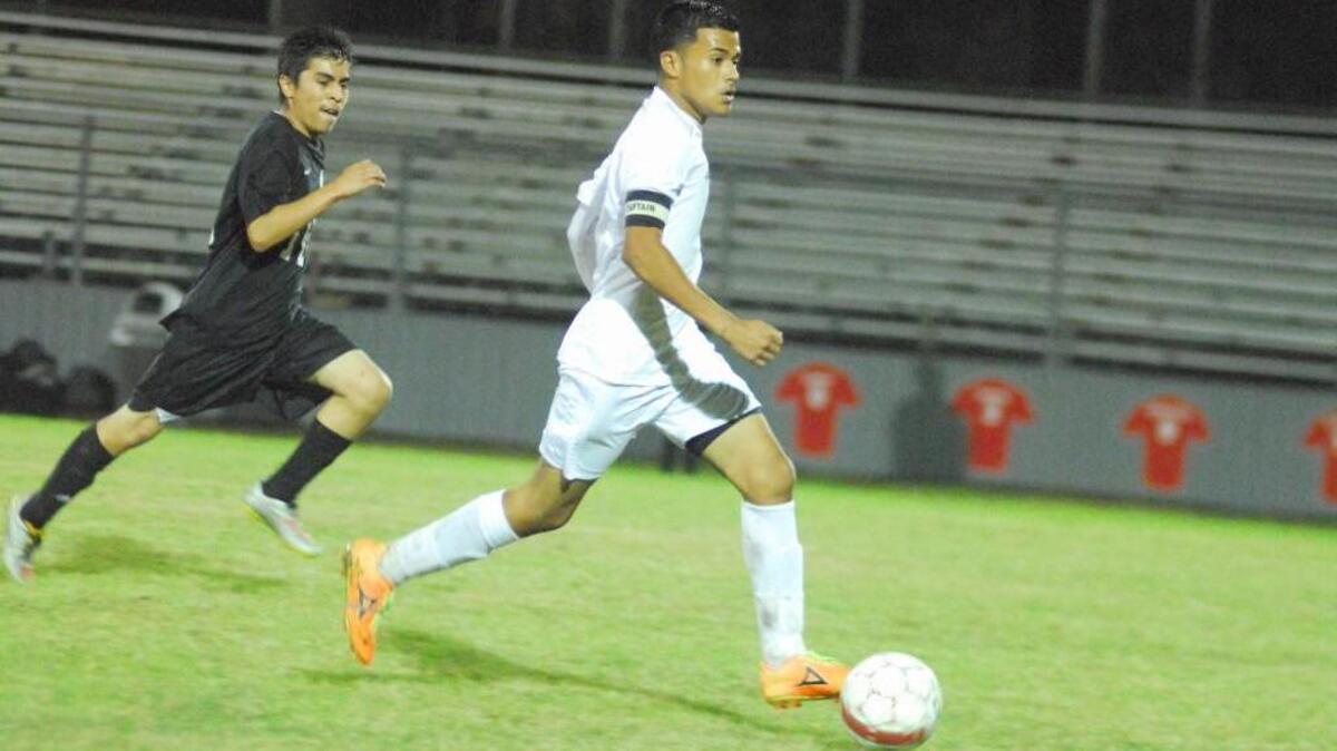 Marcos Orozco of North Johnston races downfield with the ball in Wednesday’s first round NCHSAA 2A playoff match.