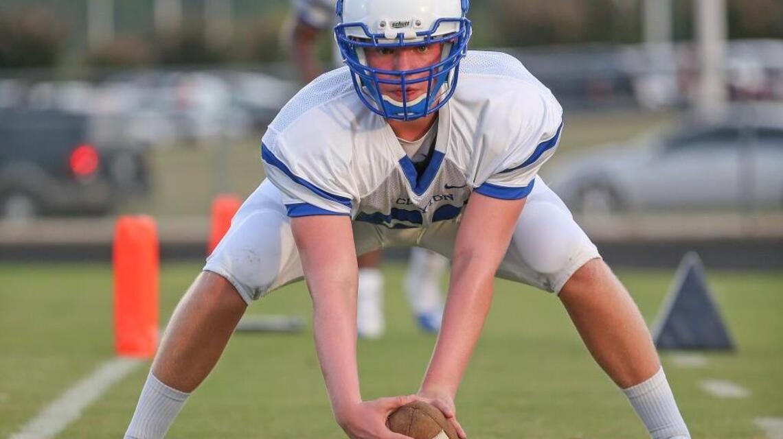 Broken hand helps Clayton long snapper’s football career
