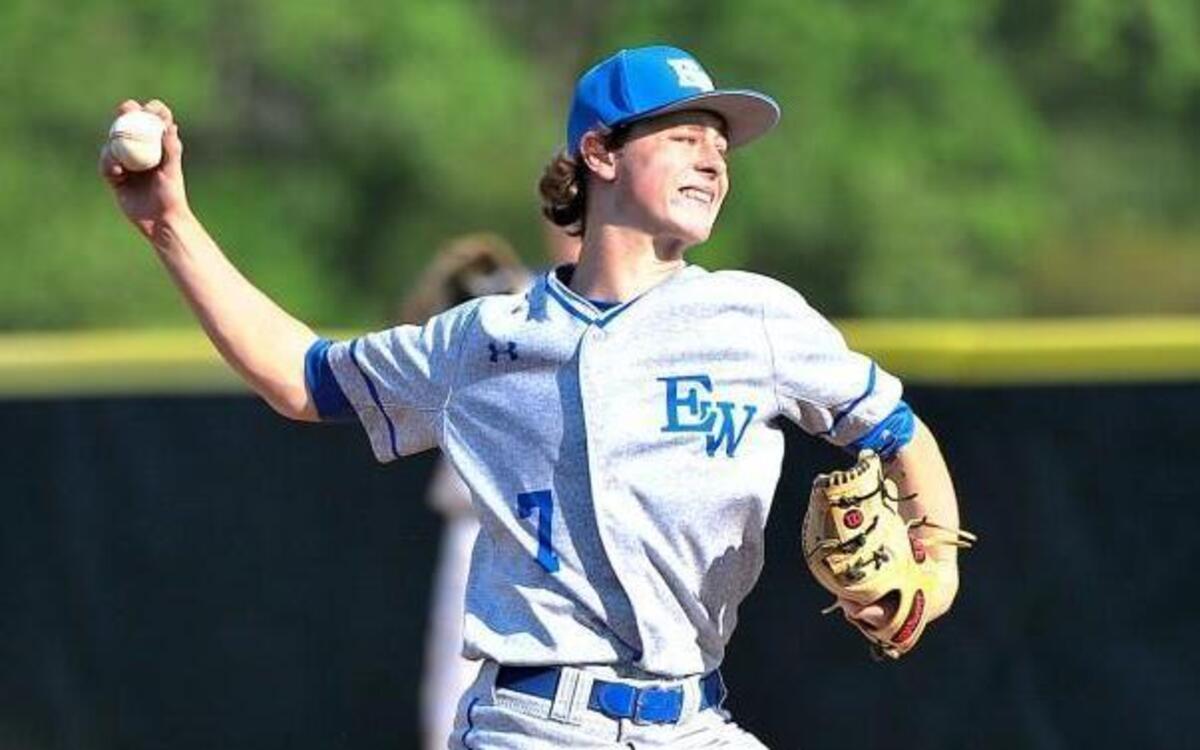 East Wake’s Trevor Creech (7) winds up for the pitch. The East Wake Warriors took on the Knightdale Knights in baseball on April 27, 2016 in Wendell, N.C. East Wake won 10-0.