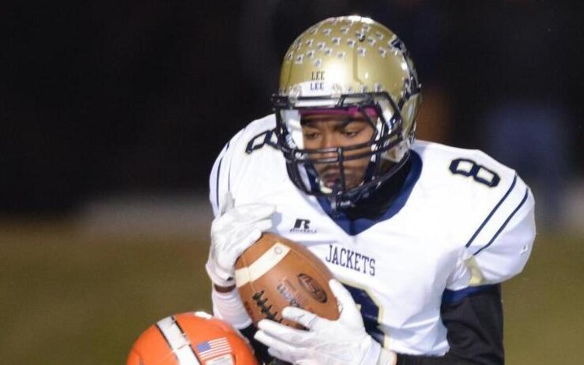 
Justin Bethea (8) of Lee County catches an interception for the Yellow Jackets. The Orange Panthers played the Lee County Yellow Jackets in Hillsborough, N.C. on Friday, November 14, 2014. Orange won 21-20.
