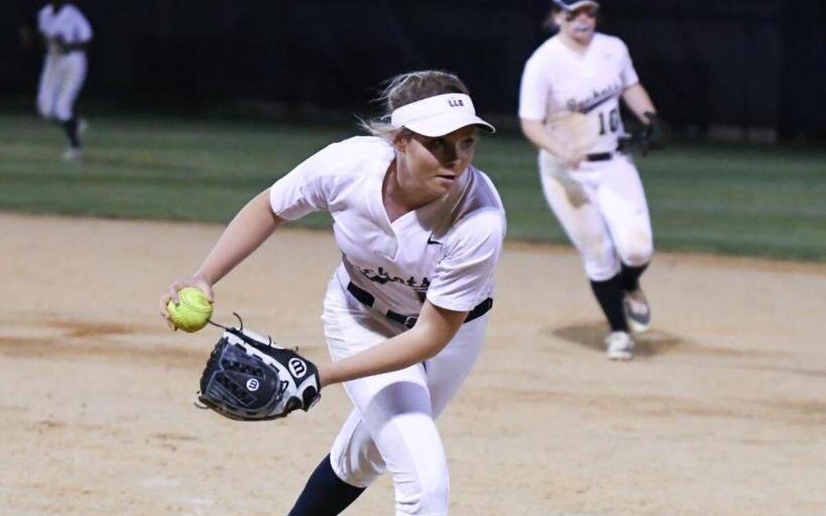 Lee County softball pitcher Whitney Sanford hurls a ball to the plate. The Lee County Yellow Jackets played the Pinecrest Patriots in a softball game that took place in Sanford, N.C. on Thursday, March 9 2017. Lee County won 4-3.