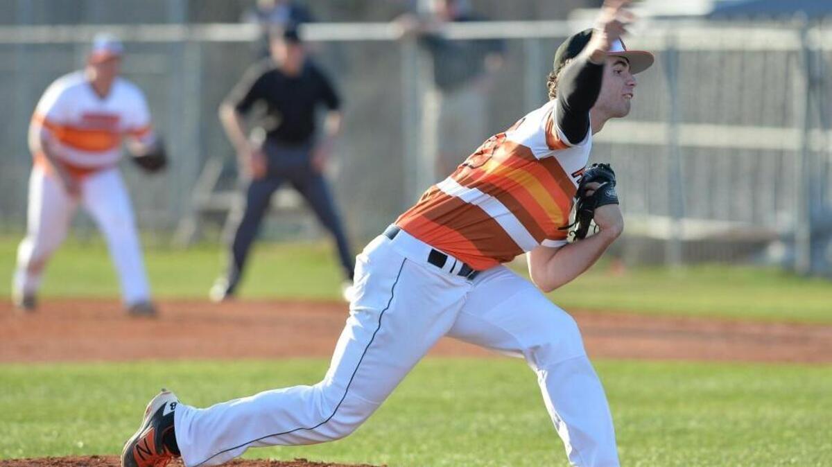 Bryse Wilson (10) of Orange throws a pitch for the Panthers. The Orange Panthers played the East Chapel Hill Wildcats in Hillsborough, N.C. on Wednesday, March 9, 2016. Orange won 2-0.
