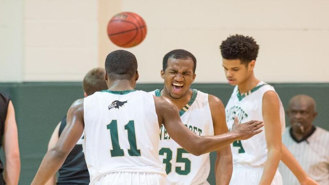 Ravenscroft's Ian Dubose (35) fires up his team after being fouled with a chance for a 3-point play during TISAC matchup between Durham Academy and Ravenscroft that took place at Ravenscroft High School on January 11, 2017 in Raleigh, North Carolina. Durham Academy girls defeated Ravenscroft. Ravenscroft boys defeated Durham Academy.