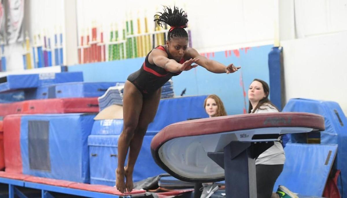 Nhyla Bryant of Rolesville performs in the vault competition during the North Carolina High School State Gymnastics Championships that took place in Raleigh, N.C. on Friday, January 26, 2018.