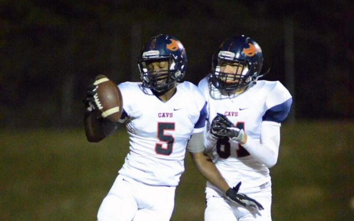 Southern Lee's Jodi Lutterloh (5) and Logan Briggs (81) celebrates after touchdown during Southern Lee's game at Union Pines in Cameron, NC on Friday Night October, 29th 2016.