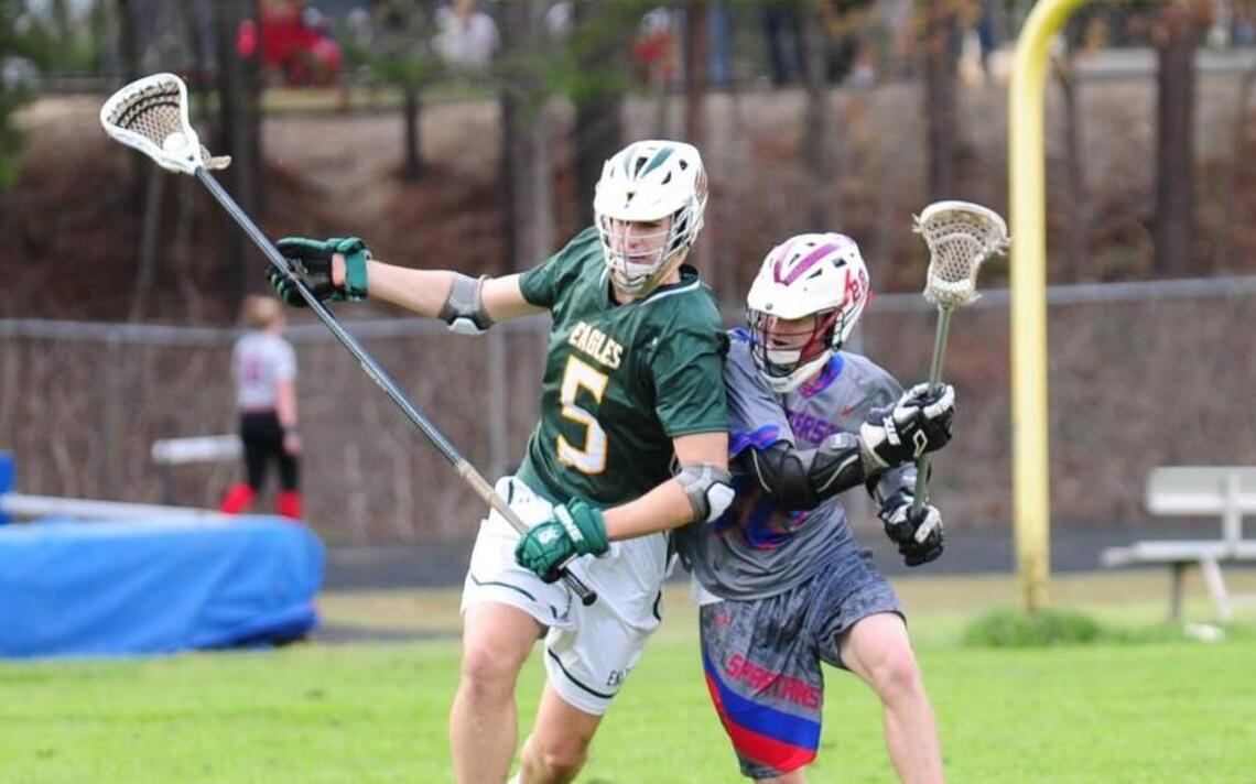 Stingy Enloe outlasts Sanderson boys lacrosse