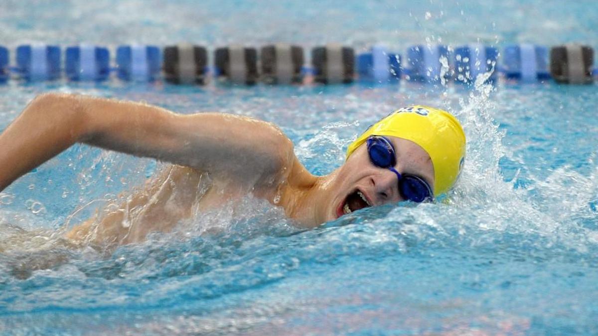 Cary Academy's Ben Humphries competes in the 200 yard freestyle during the TISAC swimming championships in Cary on Wednesday, February 4, 2016.