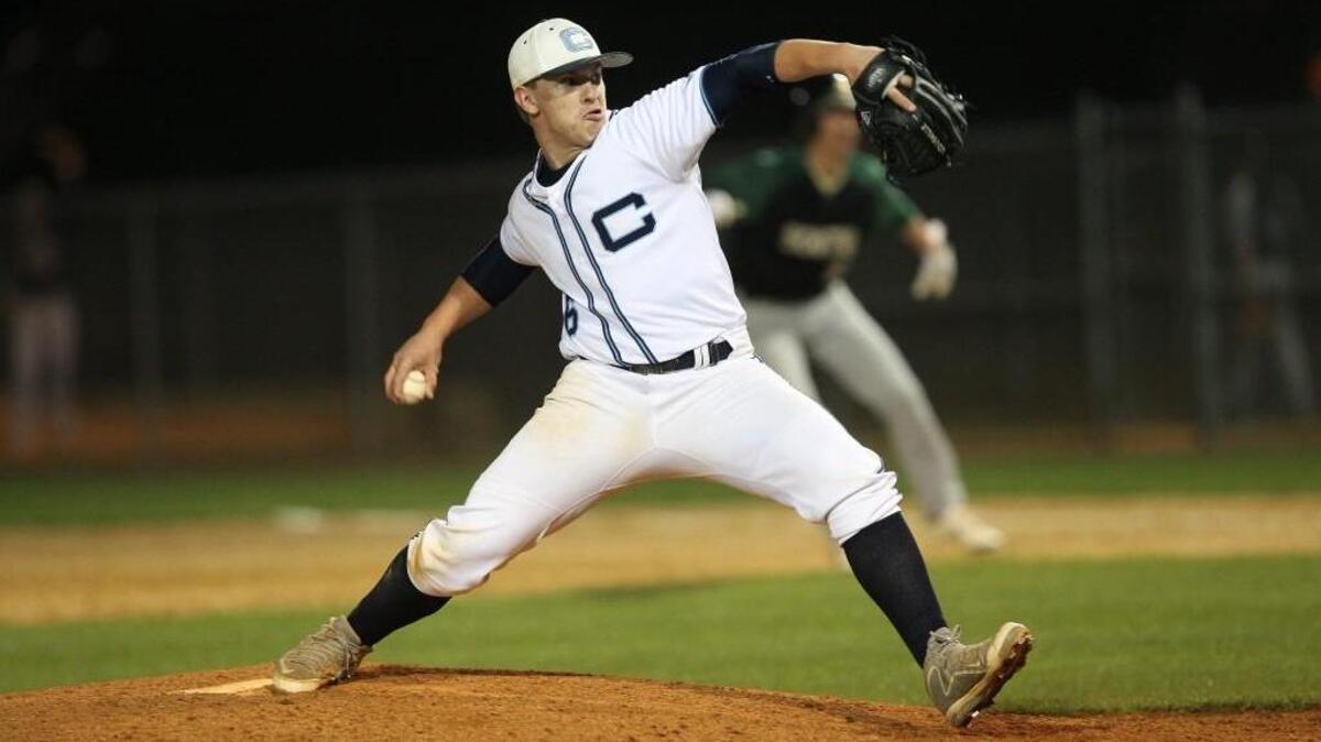 Cleveland's Will Tetrault (6) unloads the pitch on the batter during the Cleveland Rams High School baseball game against the South Johnston Trojans High School , March 22, 2016, Clayton, N.C. Cleveland won the game 9-6