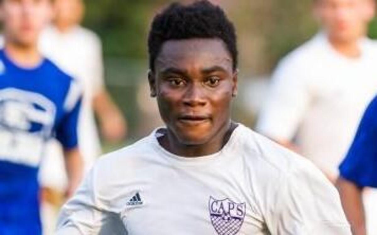 Broughton senior Elvis Wiredu (18) race toward the goal against Garner sophomore Shamari Henderson (18) in a 7-1 Caps win in August. Wiredu couldn’t participate in the playoffs after suffering a concussion.