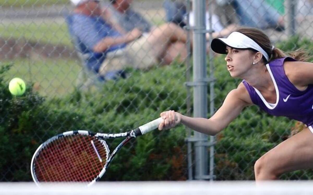 
Megan Dyer of Corinth Holders races to return a volley on her way to the Two Rivers 3A Conference singles championship Tuesday in Smithfield.
