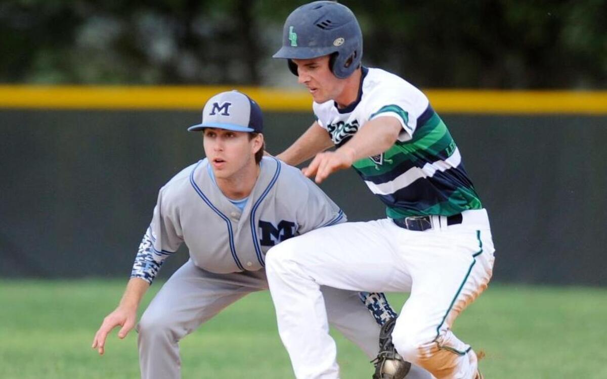 
Leesville Road's Dillon Cooper (3) steals second in front of Millbrook's Basil Rodts (3) in Raleigh on Friday, April 10, 2015. Leesville Road won 9-1.
