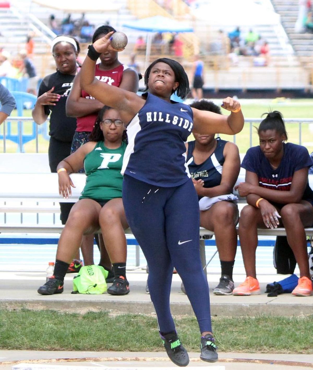 Hillside's Kayla Beasley puts some muscle behind an attempt in the girls' shot put during the NCHSAA 4A state track and field championships at North Carolina A&T State University in Greensboro, N.C. on May 19, 2017.