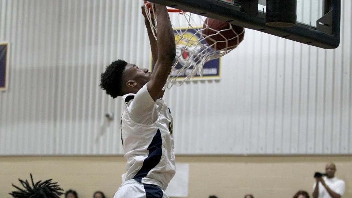 Rocky Mount Prep’s Keyshawn Bryant (11) with the dunk during the (Williamston) Riverside High School boys basketball game against Rocky Mount Preparatory in Rocky Mount, N.C. on Saturday, February 25, 2017.
