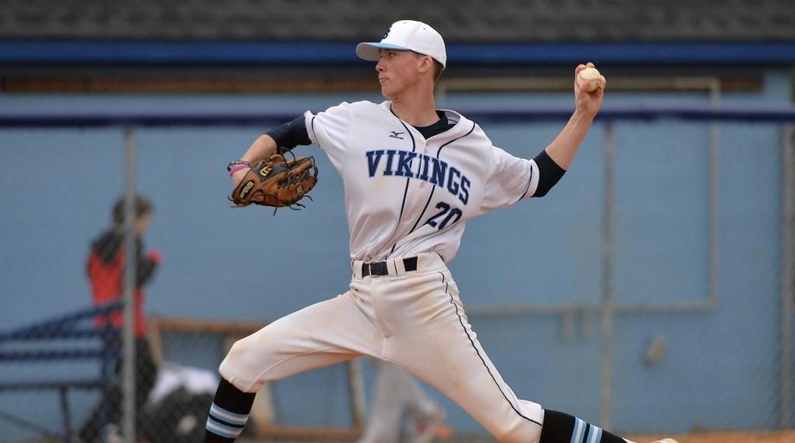 South Granville's Holden Laws (20) winds up for the pitch in the first inning. The Bunn Wildcats take on the South Granville Vikings in a Northern Carolina 2A conference baseball game in Creedmoor, N.C. on March 17, 2017. South Granville wins 11-1.