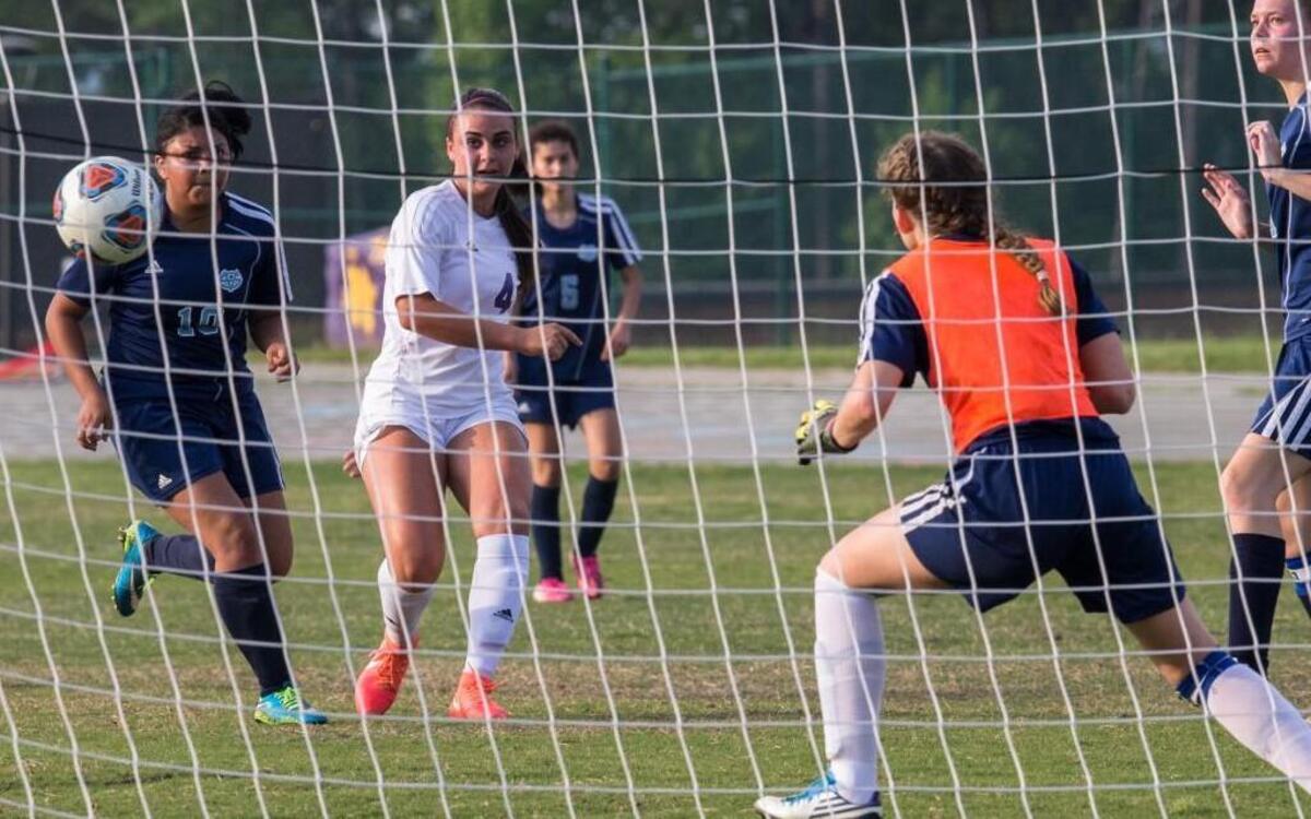 Ninth-grader Alexa Wojnovich (4) scores a goal for Carrboro in a second-round win against Southern Vance.