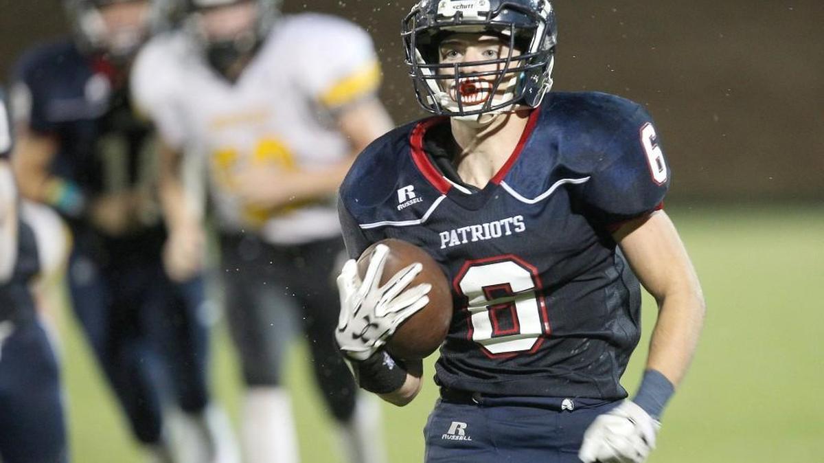 Apex Friendship's Jackson Cranor (6) makes a short gain during the Apex Cougars high school football game with the Apex Friendship Patriots high school on September 30, 2016, in Apex , N.C.