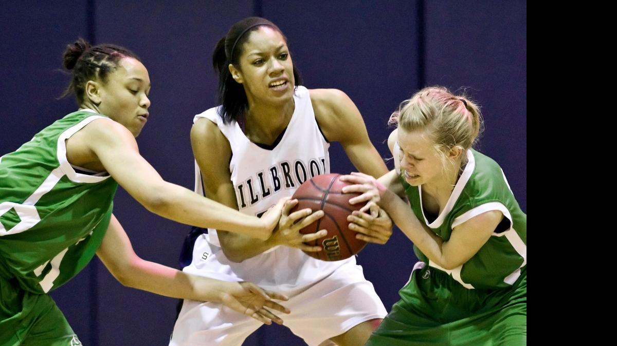 
Cary’s Whitney Coleman (31), left, and Natalie Sherwood (14), right, battle Millbroo’s Briana Day (50), center, for a loose ball during the first half. Cary High played at Millbrook High in the third round of the NCHSAA Girls playoffs on Friday, February 24, 2012. Millbrook won the game 62-19. - GREG MINTEL
