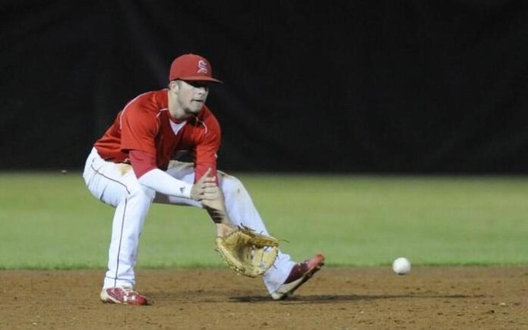 Sanderson's Cory Wood (11) fields a ground ball against Millbrook in Raleigh, N.C. on Wednesday, April 13, 2016.