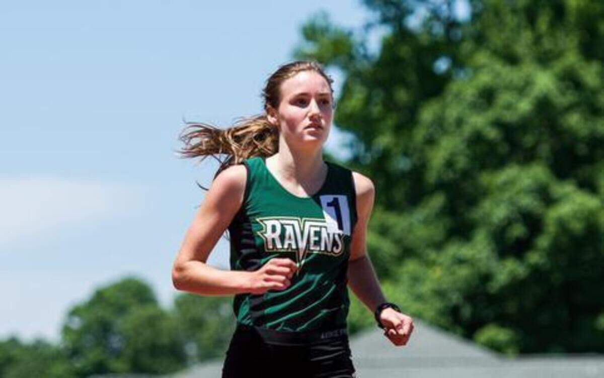
Ravenscroft’s Ryen Frazier crosses the finish line after winning the 1600 Meter Finals in the NCISAA 3A State Track and Field Championship at Ravenscroft on  May 17, 2014, in Raleigh.
