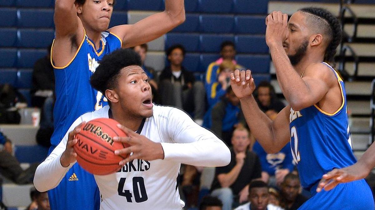 Photo Gallery: Photographer Steven Worthy's photo gallery of the Garner Trojans and Heritage Huskies in a non-conference basketball game in Wake Forest, N.C. on September 19, 2017.
