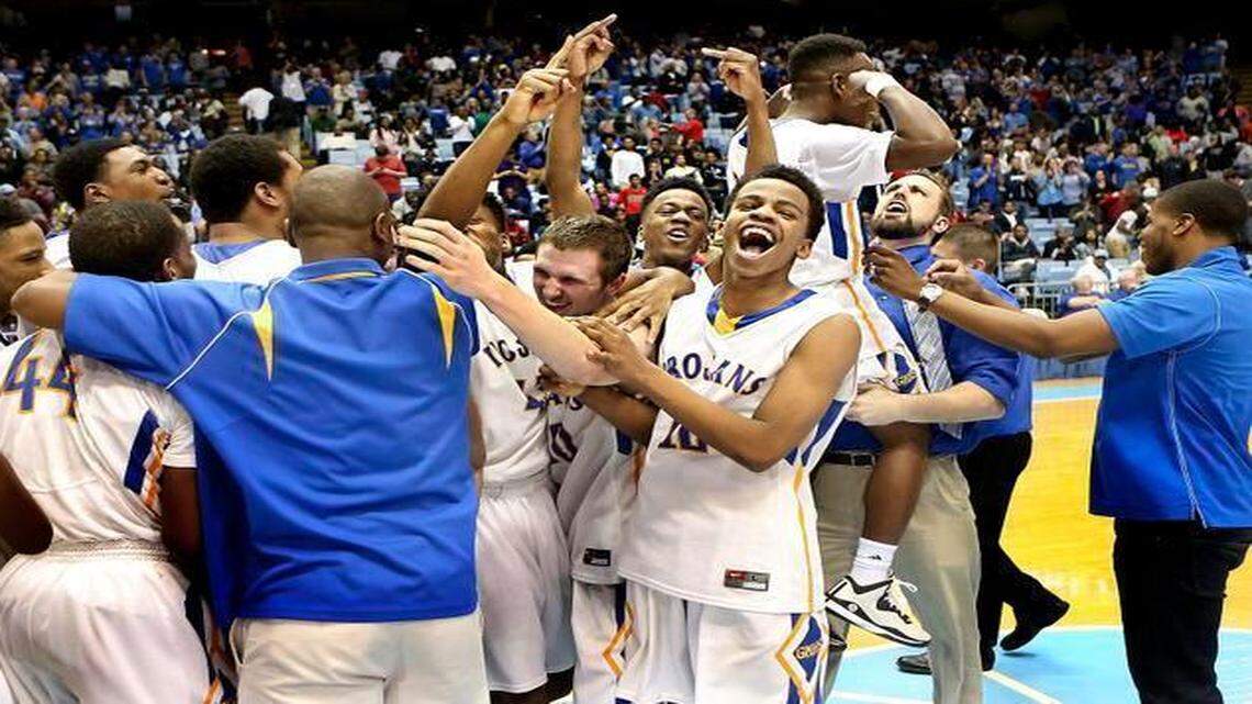 
Garner celebrates after beating Ardrey Kell 70-64 to win the N.C. 4A boys’ basketball championship at the Smith Center in Chapel Hill on Saturday.

