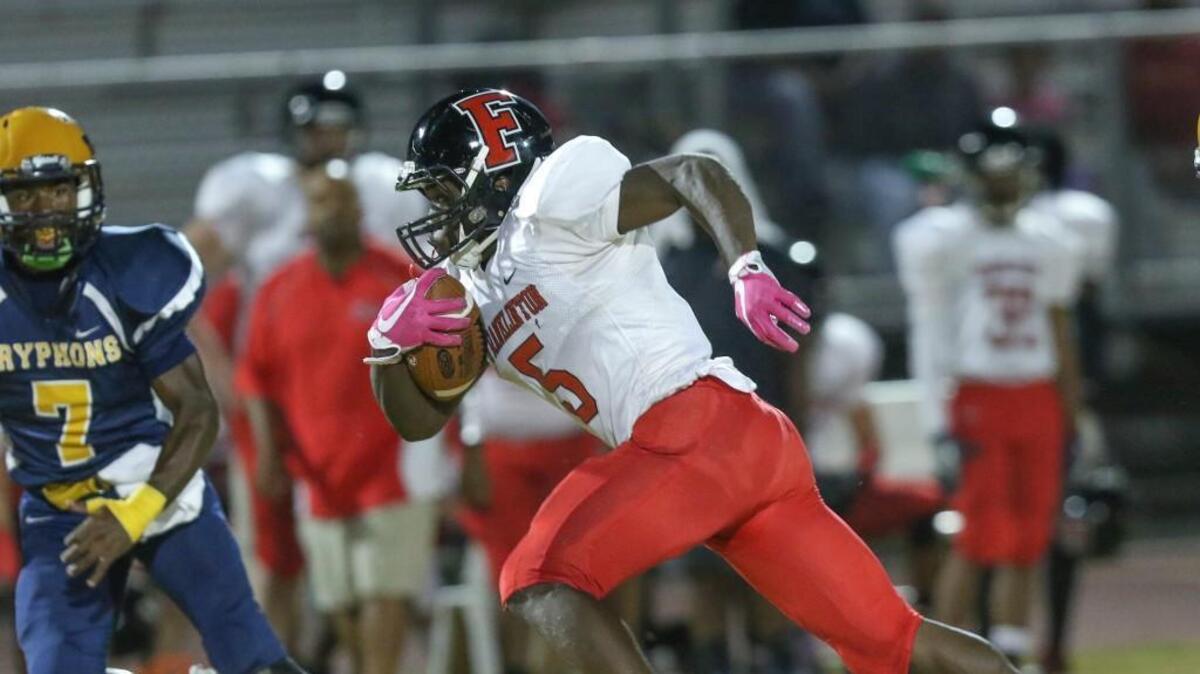 Franklinton's Kendall Harris (5) accelerates up the middle for a big gain. The Franklinton Rams visited the Rocky Mount Gryphons in a high school football game on Friday, October 6, 2017.