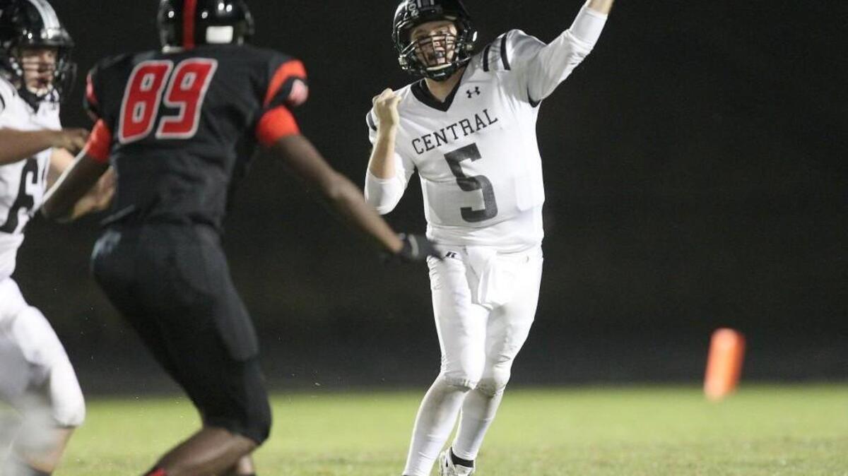 
Granville Central’s Jay Parker (5) throws downfield as Franklinton's Christian Rogers (89) runs in during the Granville Central High School football game against Franklinton High School, September,28, 2015 in , N.C. The score was 0-0 at the half.
