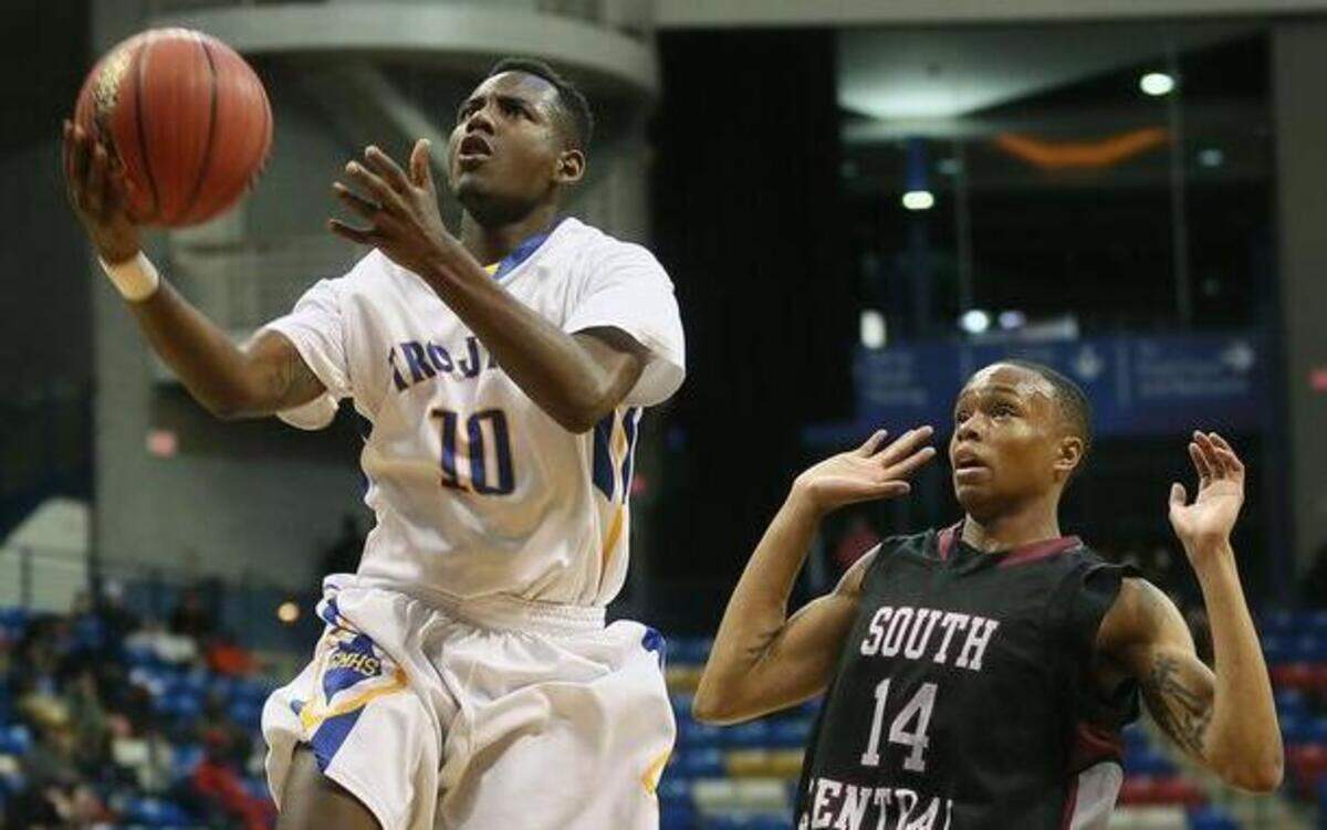 
Garner’s Julius Barnes drives for a layup, getting past  South Central's Saleik Edwards on Thursday night. .
