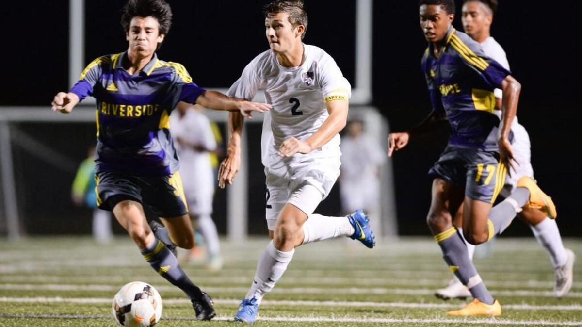 
T.J. Milby (2) of Northern dribbles through the Pirates defense, Zach Litzinger (3) and Blake Berry (17). The Riverside Pirates played the Northern Knights in Durham, N.C. on Wednesday, September 2, 2015. Northern won 2-1.
