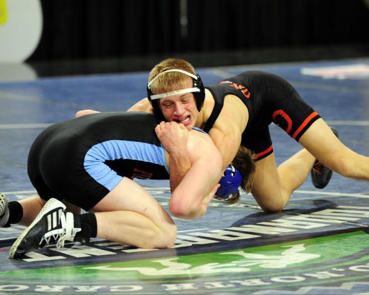 Orange's Levi Anderson and Piedmont's Matthew Coble wrestle in the 145-pound class. The NCHSAA 3A wrestling championships took place in Greensboro on Saturday, February 3, 2018.