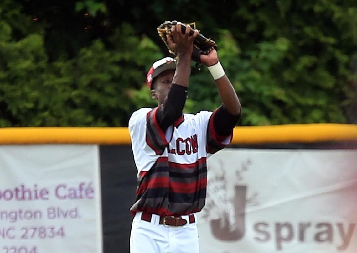 South Central's Sycere Pittman makes the out. NCHSAA Round 1 Baseball Playoffs between South Central and Green Hope. South Central won the matchup with a score of 7-5.