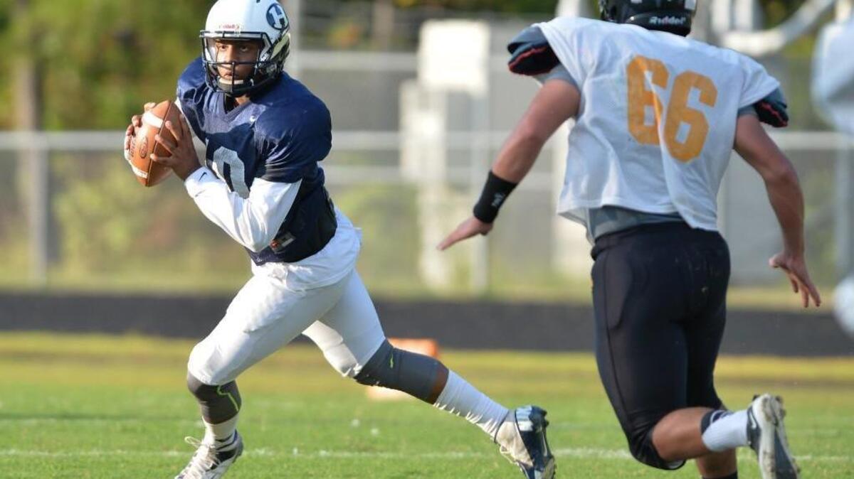 
Chauncey Caldwell (10) got most of the playing time at quarterback during early scrimmages for Hillside.
