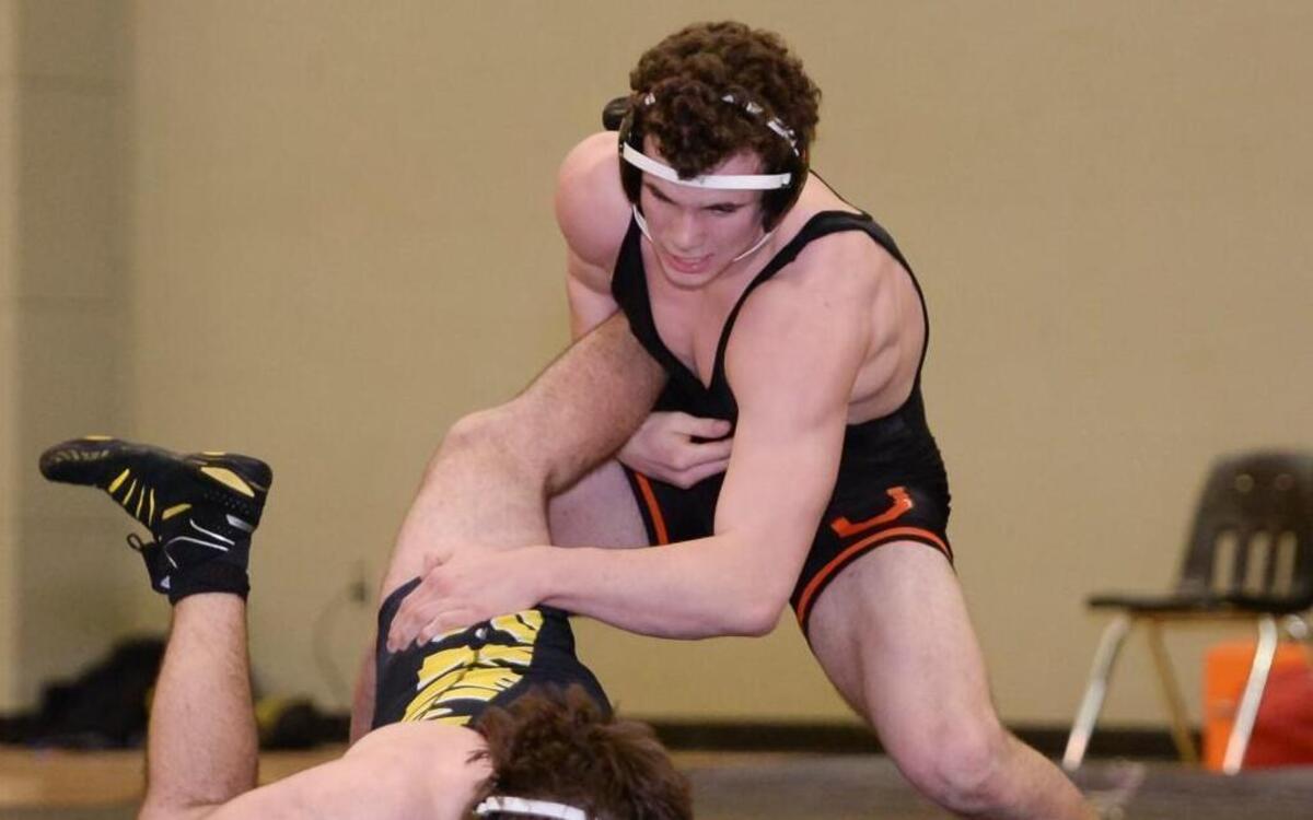 Orange enters the playoffs as the top-ranked team in the N&O area. Payton Wilson, right, of Orange, wrestles George McBurney, left, of Chapel Hill at 220 lbs. weight category during the dual team wrestling match between the Chapel Hill Tigers and the Orange Panthers in Chapel Hill, N.C. on Wednesday, January 27, 2016. Orange won 64-7.