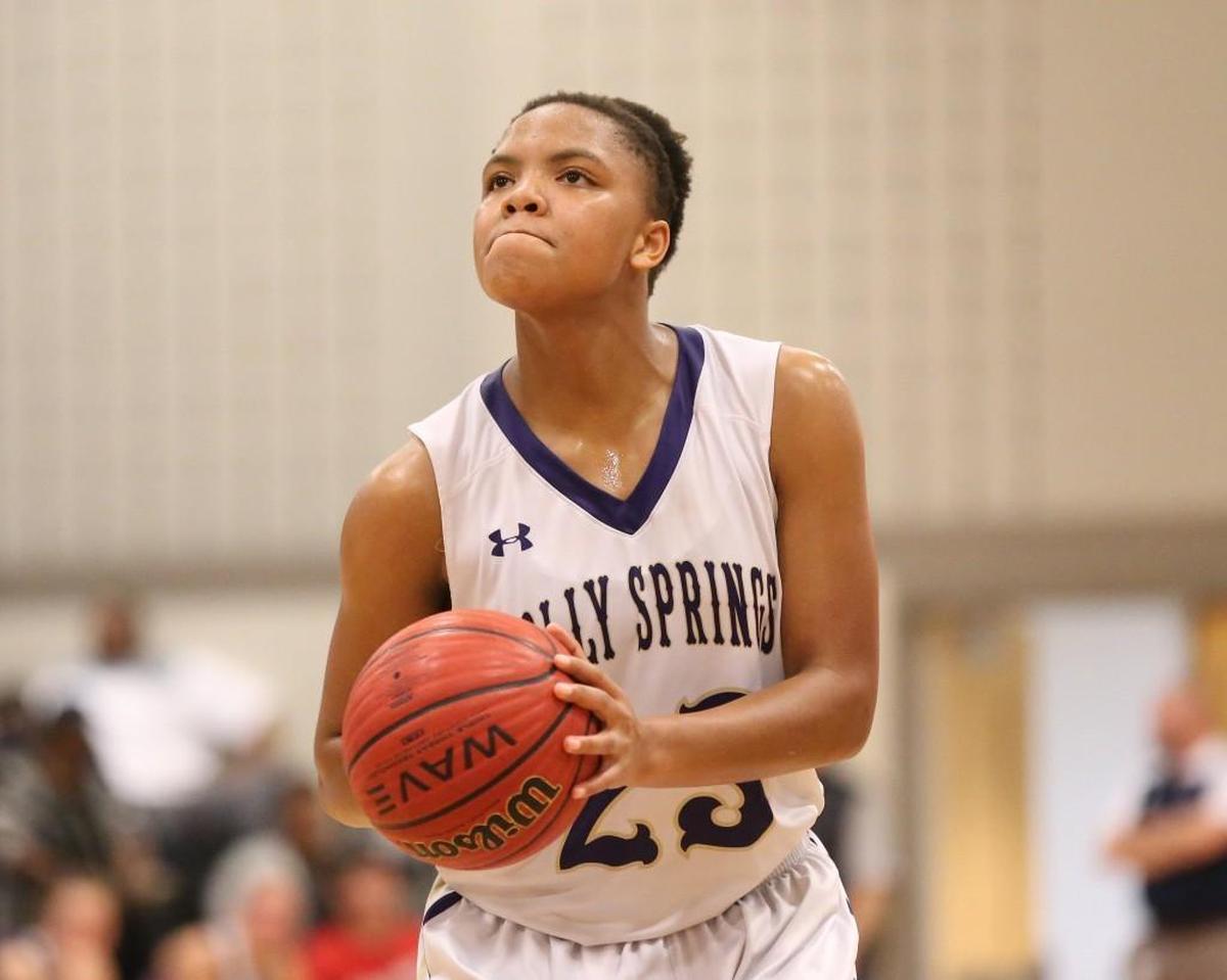 Holly Springs’ Samantha Weaver (23) shoots a free throw. The Holly Springs Hawks and Apex Friendship Patriots girls and the Garner Magnet Trojans and Holly Spring Hawks boys played in the SWAC Conference basketball tournament championships on Feb.16, 2018.