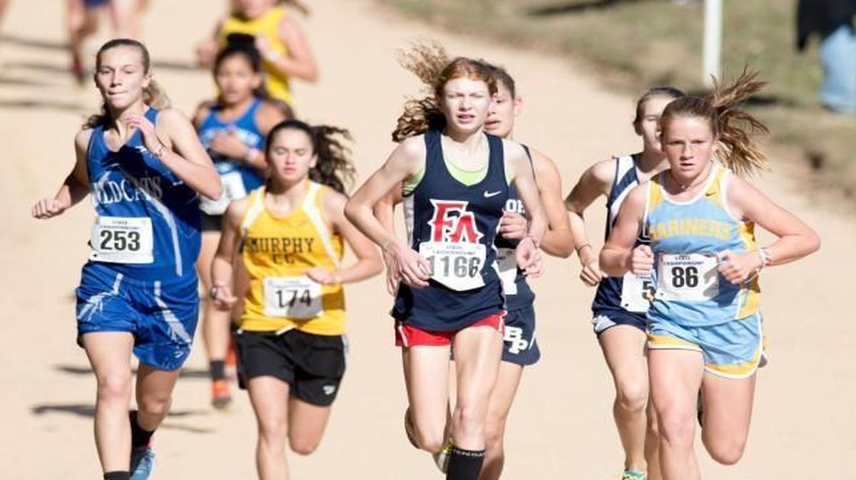 Franklin Academy's Caitlyn Burkett steadies the pace during the NCHSAA Class 1A Girls State Cross Country Championships that took place at Ivey Redmon Sports Complex on November 5, 2016 in Kernersville, North Carolina.