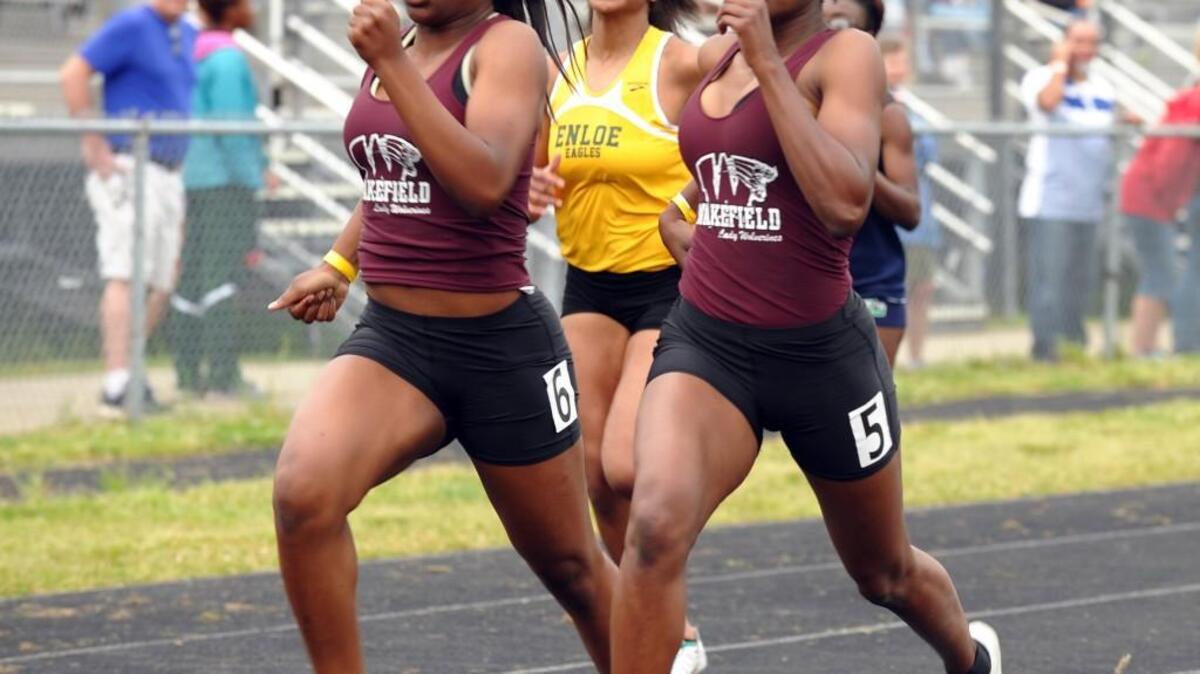 Wakefield's Tayler Grier, right, and Linda Arukwe were the top finishers in the Women's 200 Meter Dash at the Cap-8 Track & Field Championships, which were held in Raleigh on Saturday, April 30, 2016.
