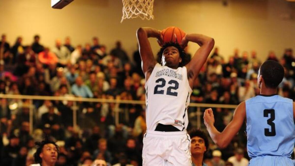 University School forward Vernon Carey, Jr. slams home two of his team-high 26 points during the Sharks 80-53 win over Panther Creek.