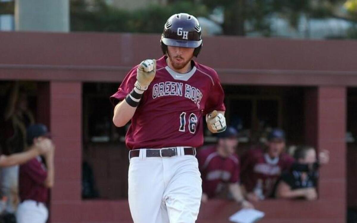 Green Hope's Austin Jones scores a run against Hoggard during the NCHSAA East Regional 4A baseball playoff game in Cary on Thursday, May 26, 2016. Green Hope beat Hoggard 3-1 to win the East Title.