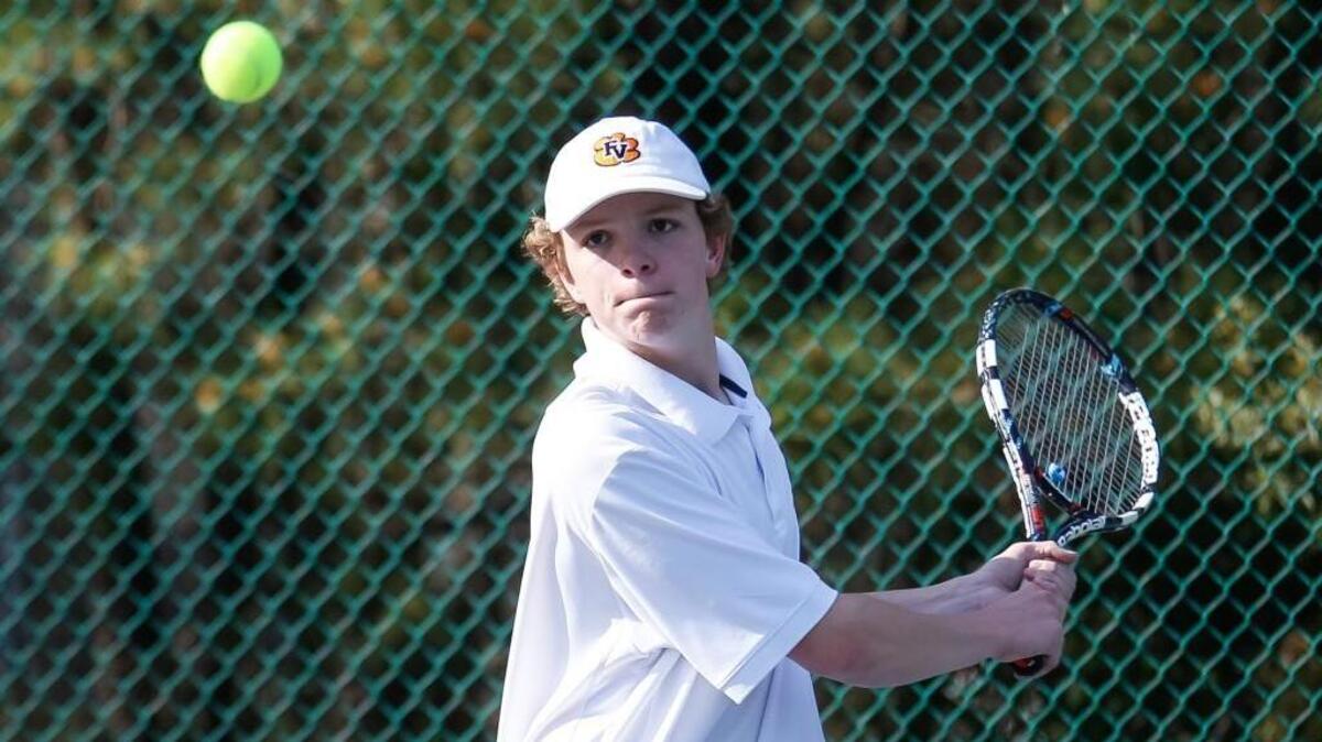 Fuquay-Varina’s Ian Dersham competes against Apex Friendship's Nick Jurado, not pictured, during Apex Friendship's boys tennis match at Fuquay-Varina on Wednesday, March 23, 2016.