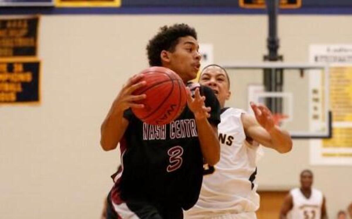 Nash Central guard Montre' Cash (3) with a break-away layup during the Nash Central High School boy's basketball game against Rocky Mount High School High School in Rocky Mount, N.C. on Thursday, January, 2017.